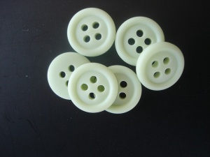 Rowan Opaque Green Plastic Buttons With Rims