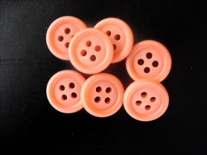 Rowan Opaque Orange Plastic Buttons With Rims